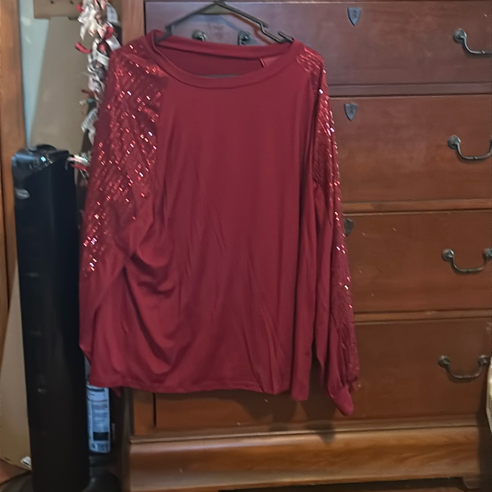 A Glittered sleeve red sweater, cute for any winter gatherings